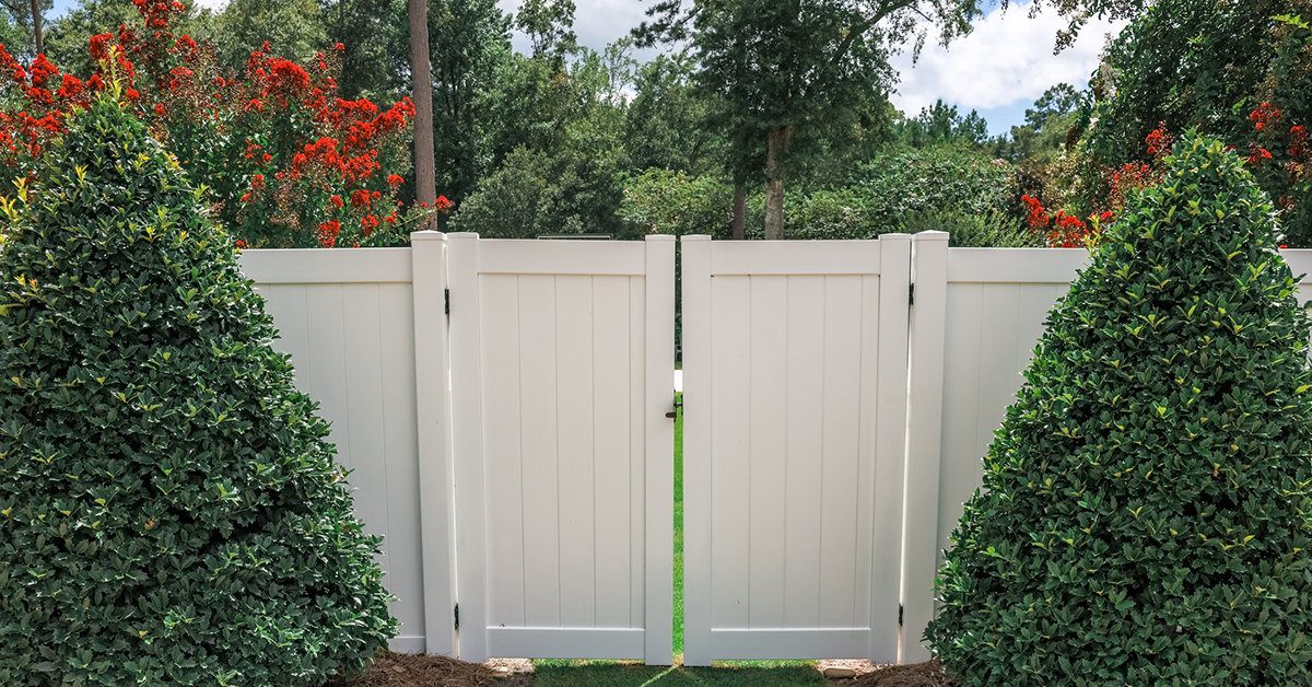 A gated entrance to a yard