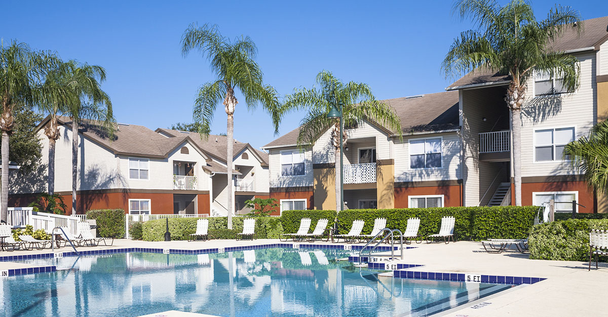 A condo development with a pool