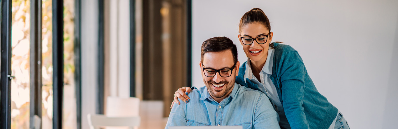 Couple working on laptop